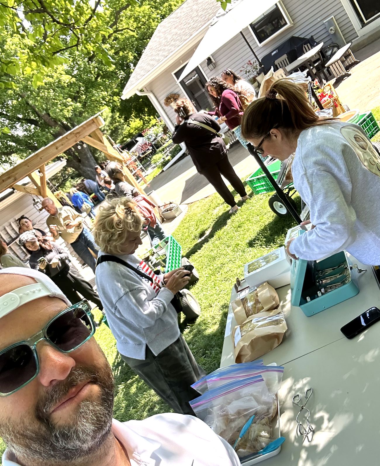 A busy afternoon at the booth — family, friends, and customers